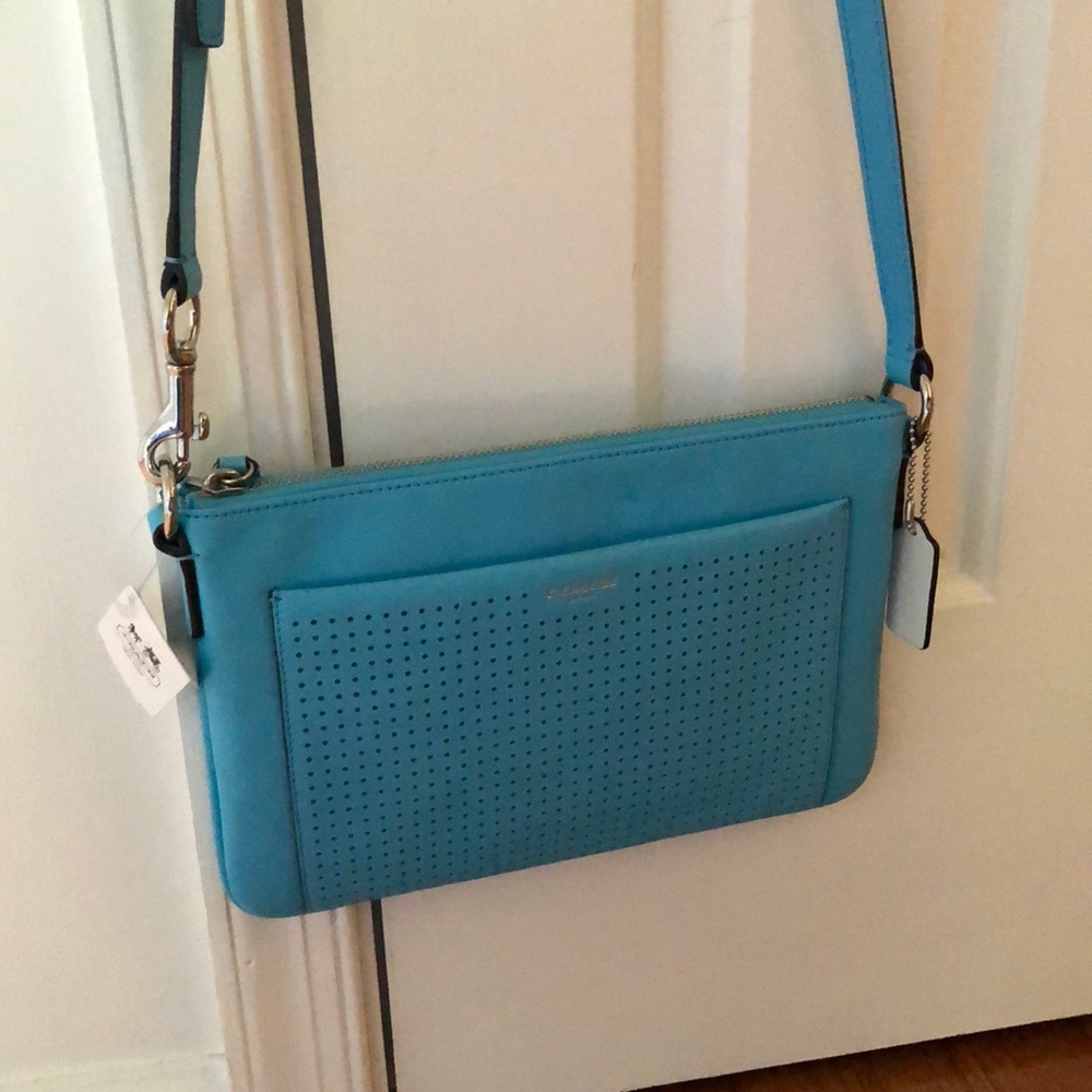 Coach handbag, NWT. east/west swing pack,orig $178